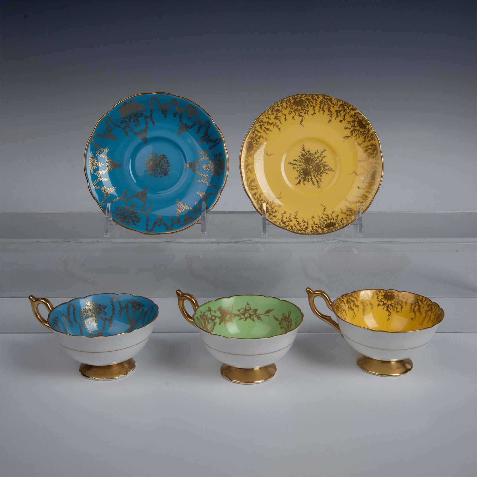 5pc Coalport Teacups and Saucers Gilded Over Color