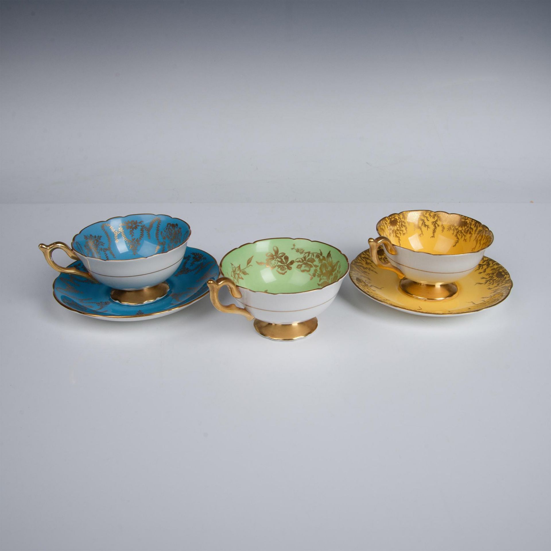 5pc Coalport Teacups and Saucers Gilded Over Color - Image 6 of 6