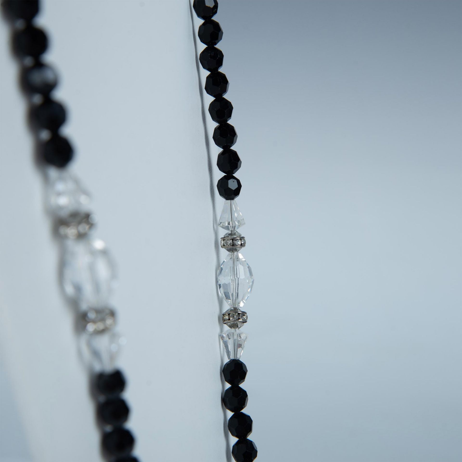 Classy Long Black and Clear Faceted Bead Necklace - Image 2 of 3