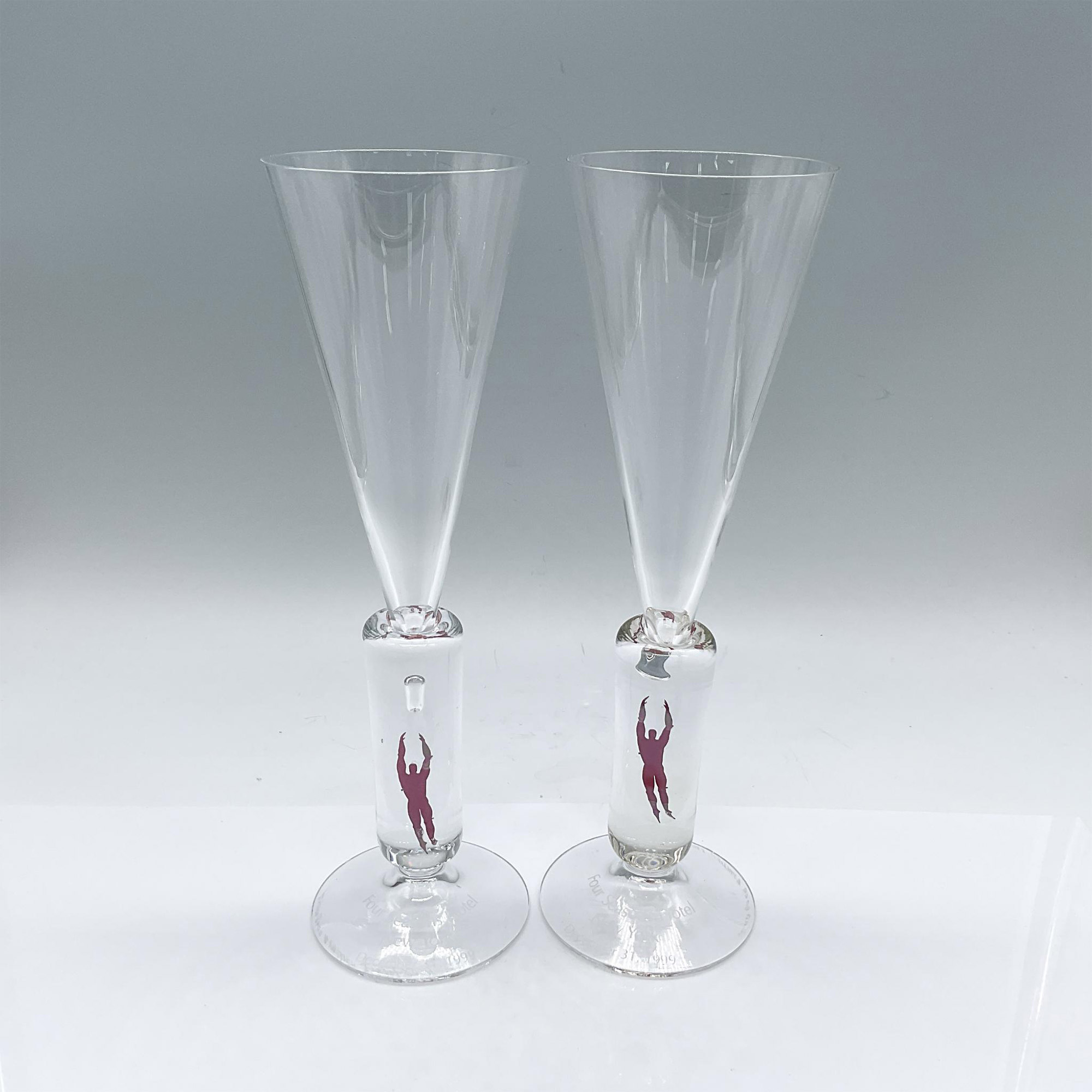 Pair of Kosta Boda Champagne Glasses, MM Millennium