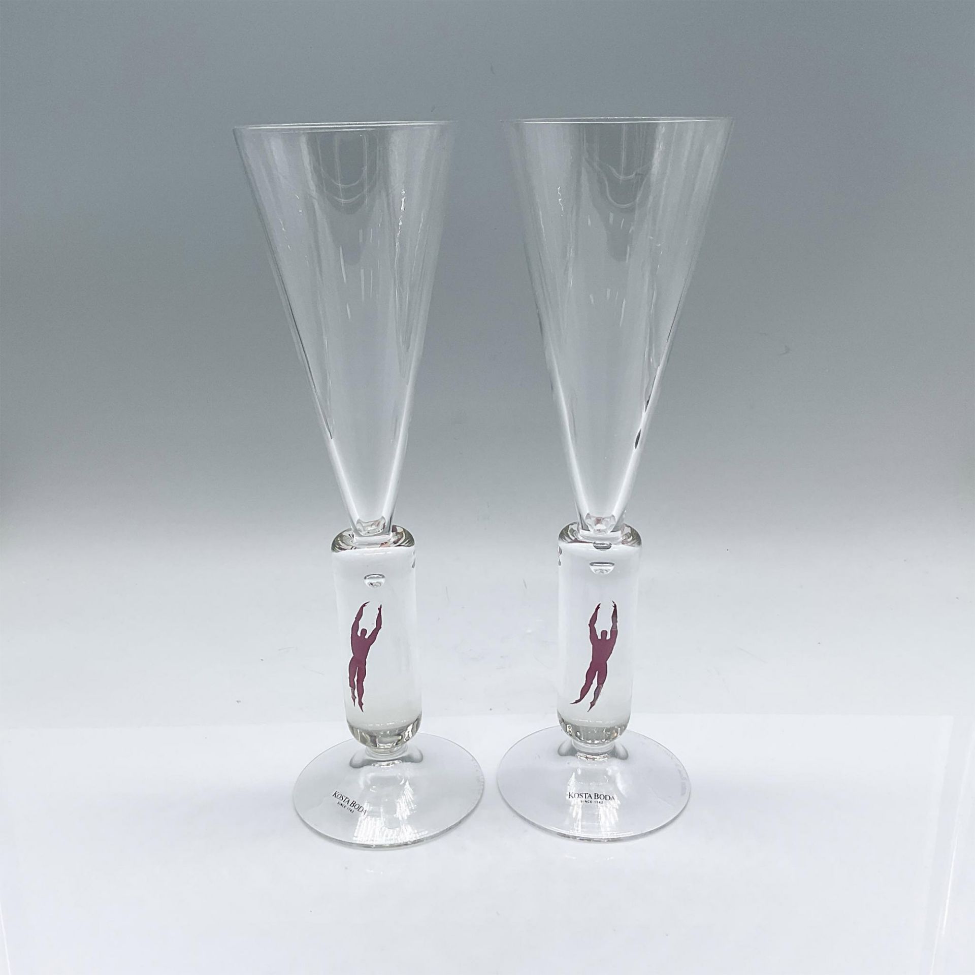 Pair of Kosta Boda Champagne Glasses, MM Millennium