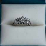 Stunning 14K White Gold and Graduated Diamond Ring