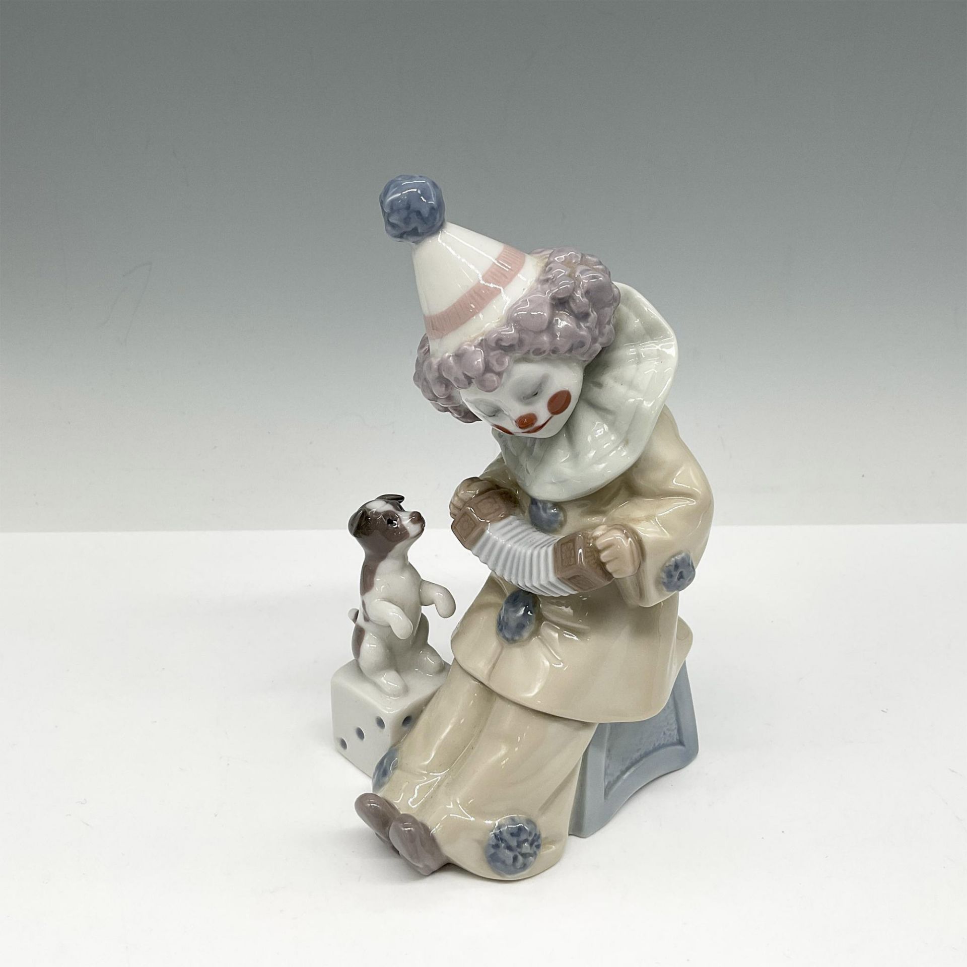 Pierrot with Concertina 1005279 - Lladro Porcelain Figurine