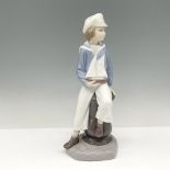 Boy with Yacht - Lladro Porcelain Figurine