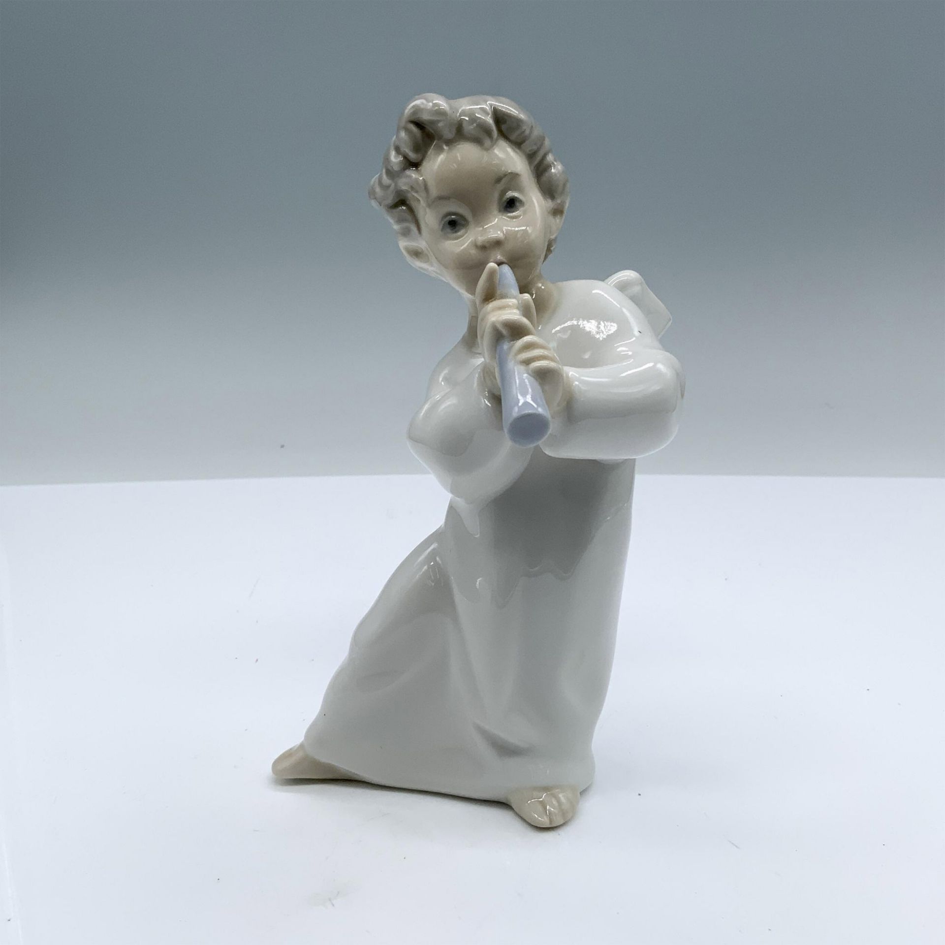 Angel with Flute 1004540 - Lladro Porcelain Figurine