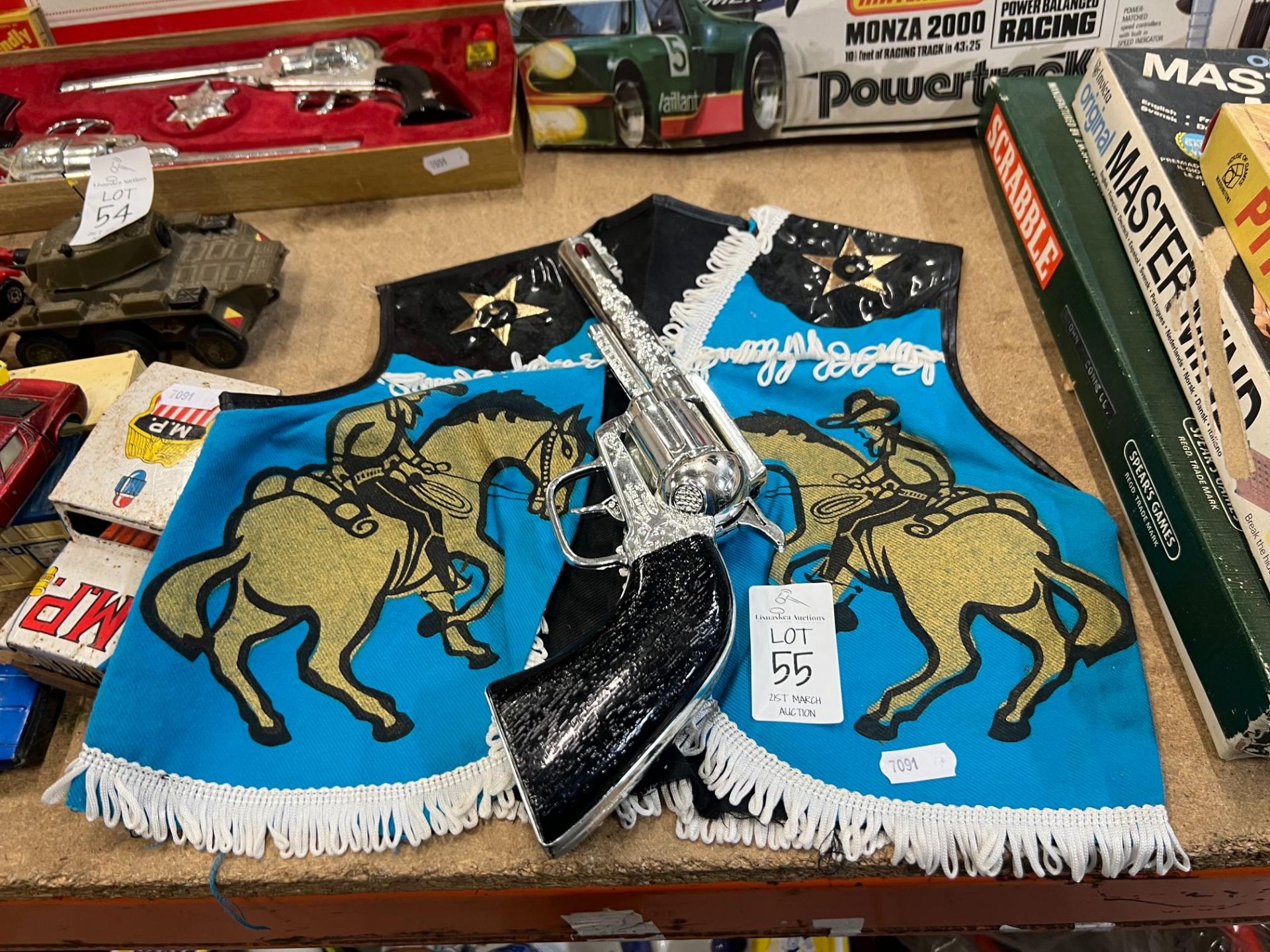 COWBOY TASSELED VEST & TOY GUN