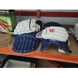 CRICKET PADS AND GLOVES