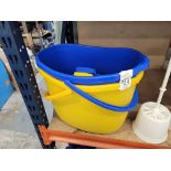 BLUE AND YELLOW MOP BUCKETS