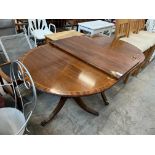 LARGE EXTENDABLE MAHOGANY INLAID TABLE WITH CLAW FEET ON CASTORS
