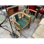 TWO GREEN TUB TYPE CHAIRS