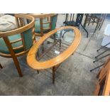 OVAL GLASS TOPPED COFFEE TABLE