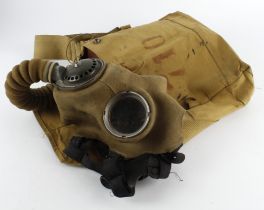 British Gas Mask and case dated 1939. Cloth covered rubber, made by the Avon tyre company. Good