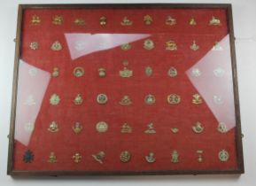 Cap badges - old time lot mounted in a giant glazed frame (54) Buyer collects !