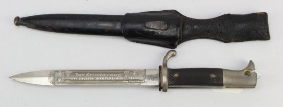 German WW2 Army bayonet with scabbard and leather frog. Blade maker marked 'F W Holler Solingen'.