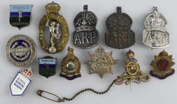 Badges (12) mostly WW1 and WW2 periods, includes 4 silver badges (3x ARP & 1 Civil Nursing Reserve)