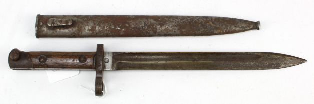 Austrian WW1 bayonet with steel scabbard and wooden grips, rusted overall