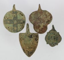 Artefacts (4) medieval bronze heraldic horse pendants, trace enamel noted.