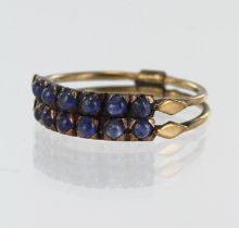 Yellow gold (tests 9ct) double sapphire half eternity ring, six round cabochon sapphires in each