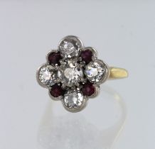 Yellow gold (tests 18ct) diamond and synthetic ruby cluster ring, principle diamond approx. 0.