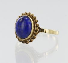 9ct yellow gold lapis lazuli dress ring, oval cabochon lapis lazuli measures 10mm x 7mm, bezel and