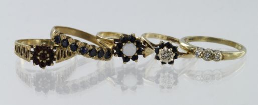 Five 9ct gold rings, stones include diamond sapphire, opal, garnet, finger sizes M, O, P, Qx2, total