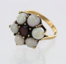 9ct yellow gold opal and garnet cluster ring, one round garnet approx. 6mm, surrounded with six opal