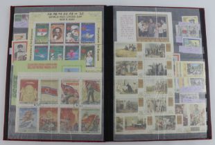 North Korea: Stockbook of North Korean stamps - mostly anti-US messages. Mint & Used 100’s.