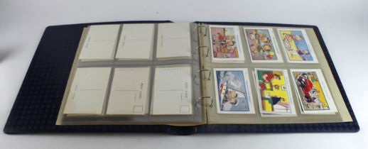 Comic postcards published by Brook, housed in a large blue modern binder, all unposted (approx 60)