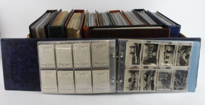 Crate containing 11 modern albums, approx 139 complete sets + some part sets, sets from Ogden,