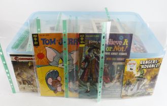 Comics. A crate containing over 140 comics and magazines, circa 1970s, including Commando; Gold