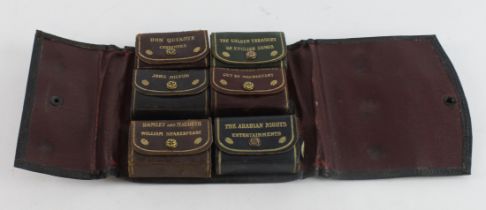Marvelous Miniature Library. A group of six leather bound miniature books by the Miniature