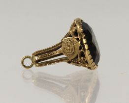 9ct yellow gold pocket watch fob, set with one 20mm smokey quartz, mount decorated with a rose,