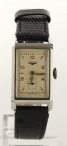 Gents stainless steel cased Longines manual wind wristwatch, 1939. The silvered dial with gilt