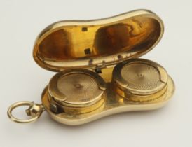 9ct gold kidney shaped twin Sovereign holder, hallmarked Birmingham 1910 Total size including loop