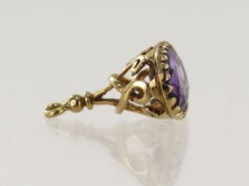 9ct yellow gold pocket watch fob, set with one oval amethyst measuring 16mm x 12mm, weight 4.3g.