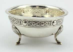 Irish silver bowl in the Celtic manner on three hoof feet, slightly mis-shapen, hallmarked CL