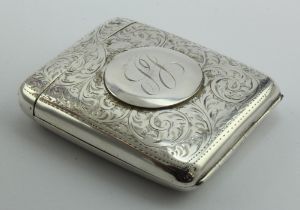 Unusual press-stud type floriate engraved, top-opening, silver cigarette case (central stud is a