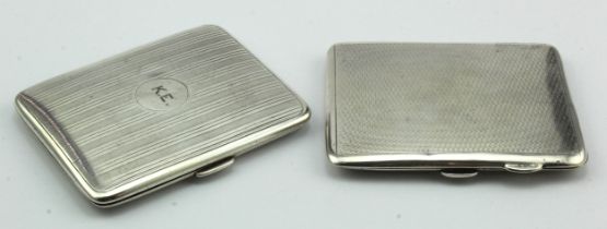 Two silver cigarette cases hallmarked Birm, 1919 & 1935. Weight of both 5.5 oz approx