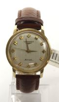 Gents 14ct cased Longines automatic wristwatch, circa 1960. The silvered pattern dial with gilt