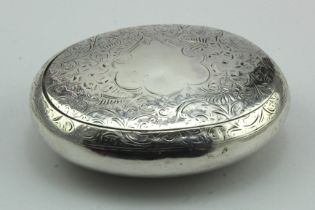 Floriate engraved silver tobacco box, opens with a squeeze action, has a repair to the hinge but