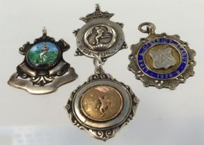 Four silver football themed fob medals/pendants, total weight 41.2g.