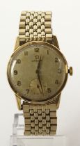 Gents gold plated Omega manual wind wristwatch, 1961. The silvered (though tarnished) dial with gilt