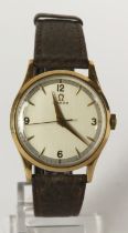 Gents 9ct cased Omega manual wind wristwatch, 1950. The silvered dial with gilt Arabic numerals at