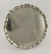 Large silver pie-crust salver on four ball feet - front reads "Jim & Tessa 10th January 1959"