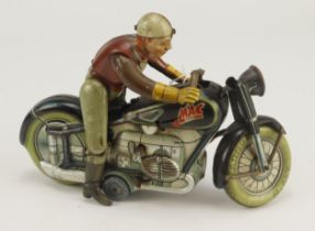 Arnold tinplate clockwork Mac 700 motorcycle and rider, height 13cm, length 18cm approx. (not