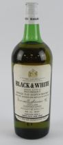 Whisky. A Bottle of Black & White Special Blend of Buchanans Choice Old Scotch Whisky