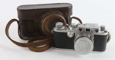 Leica III rangefinder camera (no. 371625), with Summitar f=5cm 1:2 lens (no. 526976), contained in