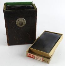 Ernemann plate camera, with a group of plate holders, etc., contained in a leather case (sold as