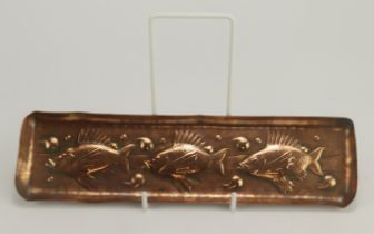 Newlyn copper pen tray, decorated with three fish, stamped 'Newlyn', length 26.5cm, depth 7cm