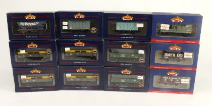 Bachmann. Twelve boxed Bachmann OO gauge wagons, including 38-085A (x4), 38-100, 38-095, 33-306D,